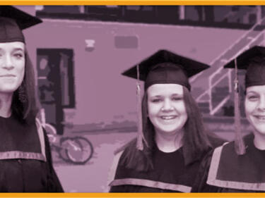 Graduate students in cap and gown